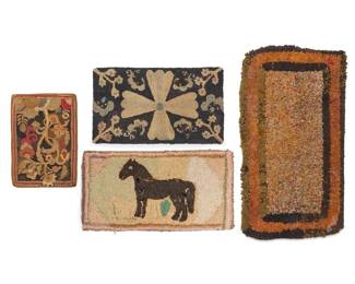 1305 A group of American hooked rugs Late 19th/20th century Comprising four folk art mat rugs in various styles and sizes, including a horse motif mat, a small mat with intertwined floral sprigs and branches, a small black mat with floral sprigs and a central floral cross motif, and a large orange and brown multicolored tufted rug with banded edges, three of the rugs mounted to a fabric-covered stretcher 4 pieces Largest: 23" H x 41.5" W; Smallest: 22" H x 15.75" W Estimate: $500 - $700