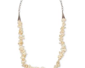 1398 A Southwest Zuni-style carved fetish necklace Mid/late 20th century With unknown artist's mark to pendant base A single strand necklace with graduated carved bone animals including rabbits, birds, bears, turtles, bison, and bighorn sheep, suspending a central carved bone katsina figure pendant, the necklace with silver cone tips and silver chain link clasp 35" L x 2 "H 105.6 grams gross Estimate: $300 - $500