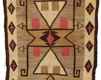 1217 A Navajo Storm Pattern rug Early 20th century, Diné Woven in dark brown, red, ochre, tan, and natural grey/brown, the border with floating crosses within stepped and smooth diamonds 69.5" H x 48" W Estimate: $400 - $600
