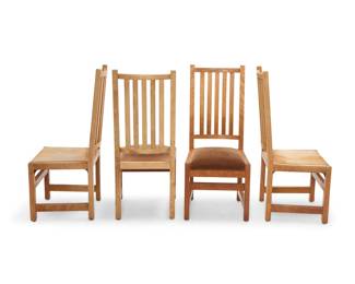 1298 A set of four Arts & Crafts style oak spindled side chairs Mid/late 20th century Each unmarked Comprising two with leather seat and two with mohair seat, each with five spindle back 4 pieces Each: 44.5" H x 19" W x 22.5" D Estimate: $700 - $900