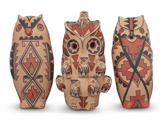 1160 Three Jemez Pueblo polychrome pottery owls Mid/late 20th century Two signed to underside: MRS / P.M.G. / JEMEZ / PUE. / N M.; one signed: M. Romero [Marie Gachupin Romero (1927-2007)] / Jemez Each three-color figure with black and red geometric motifs on a cream slip ground 2 pieces Tallest: 11.5" H x 6.25" W x 5.75" D Estimate: $200 - $400