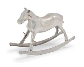 1280 A Pony Boy aluminum rocking horse Circa late 1940s Marked in the casting: PONY BOY MFG CO KALAMAZOO MIC 23.25" H x 11.75" W x 34" D Estimate: $200 - $400