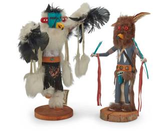 1212 Two Southwest painted carved cottonwood katsinas Late 20th/early 21st century Eagle signed, titled, and numbered to underside: M. W. BEGAY / EAGLE / T.T. / 401,468; owl signed and inscribed: OWL KACHINA / BY / E[indecipherable] B. Comprising an Eagle Dancer katsina mounted with hide, fur, feathers, and turquoise, and an owl katsina mounted with hide, fur, feathers, and metal 2 pieces Eagle: 12.5" H x 10" W x 6.25" D; Owl: 11.5" H x 7" W x 4.625" D Estimate: $200 - $400
