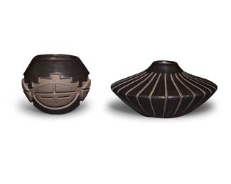 1157 Two Santa Clara Pueblo blackware pottery jars Anita Louise Suazo (b. 1937) A melon jar, late 20th/early 21st century Incised to underside: Anita L Suazo / Santa / Clara / Pueblo With nearly flat shoulder, deeply incised with vertical lines 3" H x 6" Dia.  Madeline Naranjo & Adrian Garcia (b. 1971 & b. 1973, Tewa Pueblo) A 'Tawa' sunface jar, early 21st century Incised to underside: Madeline / Naranjo / Adrian / Garcia / SCP Incised with Hopi Tawa faces, painted in a matte black slip 3.25" H x 4" Dia.  2 pieces Estimate: $400 - $600