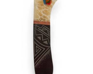1200 Cliff Fragua (b. 1955, Jemez Pueblo) "Rain Spirit", 2012 Signed and dated verso: C. Fragua / '12 / © / SSS [Singing Stone Studio] A Jemez Pueblo carved marble and calcite knife with turquoise and parrot feathers 14" H x 4" W x 0.5" D Estimate: $200 - $400