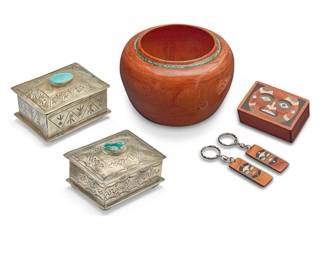 1391 A group of Southwest style table items Late 20th/early 21st century Three marked for maker Six works comprising a Larry Demrick turned acacia wood bowl with a band of turquoise chip inlay to shoulder (4.5" H x 6.75" Dia.), two J. Alexander stamped German silver mixed metal jewelry boxes, each with set turquoise (each: 2.5" H x 4.125" W x 3.125" D), and a Northwest Coast-style small wooden box with mask motif in various colored wood and shell inlay, and two matching wood inlay key fobs (box: 1.375" H x 3.5" W x 2.375" D; fobs: 4.5" H) 6 pieces Estimate: $300 - $500
