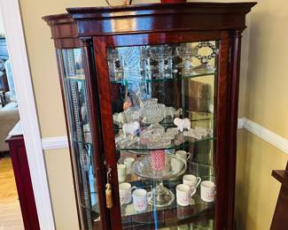 Exquisite curved glass curio. Even the glass shelves are custom cut / shaped
