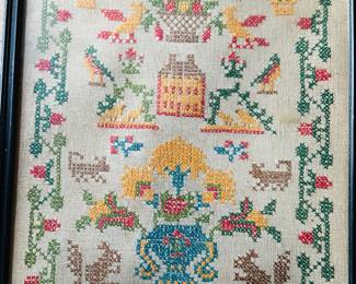 Several hand-embroidered samplers