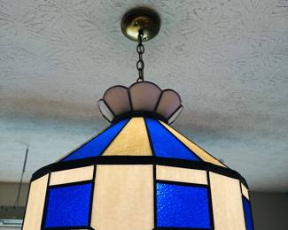 Several vintage stained  glass pieces throughout the home. 