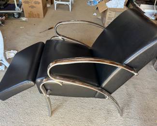 Reclining chair after Miles van der Rohe