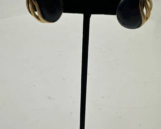 Pair Of Round Stud Earrings With A Swirling Textured Design