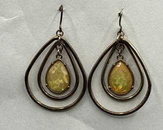 Pair Of TeardropShaped Dangle Earrings With Faceted Gemstone