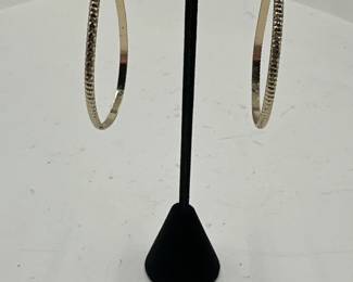Pair Of TeardropShaped Textured GoldTone Hoop Earrings