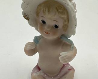 Vintage Bisque Porcelain Piano Baby Figurine