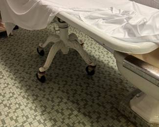 Old porcelain embalming tables.  There are 3