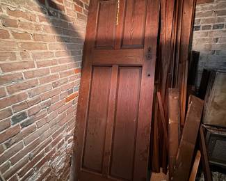 Huge solid wood doors, original to the home