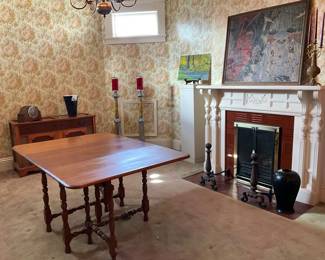 Antique dining table with leaves