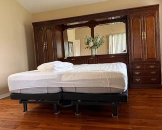 Adjustable bed. Good shape. Small stain Thomasville headboard/ cabinet