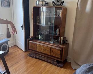 Art Deco waterfall" edge, is particularly characteristic of the work of Czech designer Jindrich Halabala, Bar Cabinet with Glass Doors