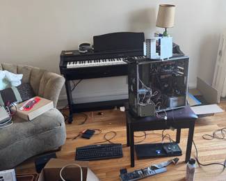 Electric Keyboard with Stand and Surrounding Electronics