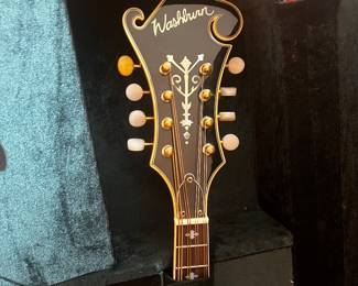 Washburn Americana Series F-style mandolin, specifically the M3SWE or M3SW model in a Trans Wine Red finish $900 