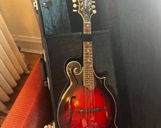 Washburn Americana Series F-style mandolin, specifically the M3SWE or M3SW model in a Trans Wine Red finish$900 