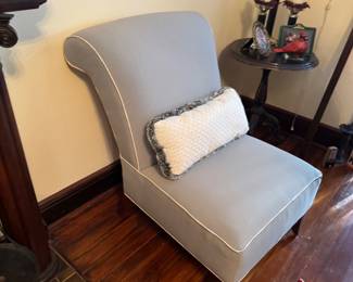 Curved Back Upholstered Armchair with Decorative Trim