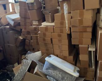 Large Collection of Stacked Boxes and Packing Materials
