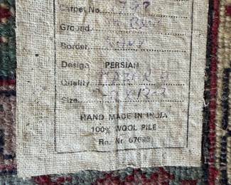 Rug tag: hand-made in India, 100% wool pile, Persian design.