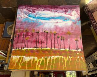 Abstract painting with yellow drips and pink fluid textures.