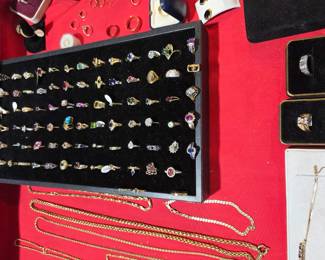 Assorted Gold jewelry. This is a few of the hundreds of Gold rings in this sale 