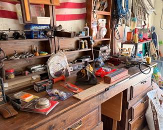 Wooden Workbench with Assorted Tools and Hardware
