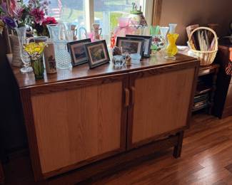 Oak Cabinet with Assorted Decorative Glassware and Vases
