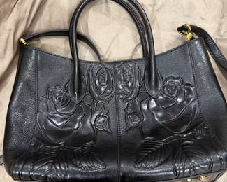 Leather Handbag by Pijushi