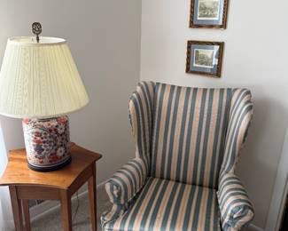 Chair, side table, lamp, pictures