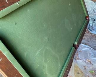 Pool table in a shed at the back of the property