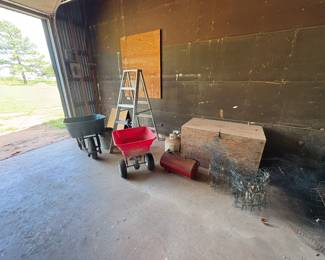 wood box, ladder, wheel barrow, spreader, air tank, wire edging