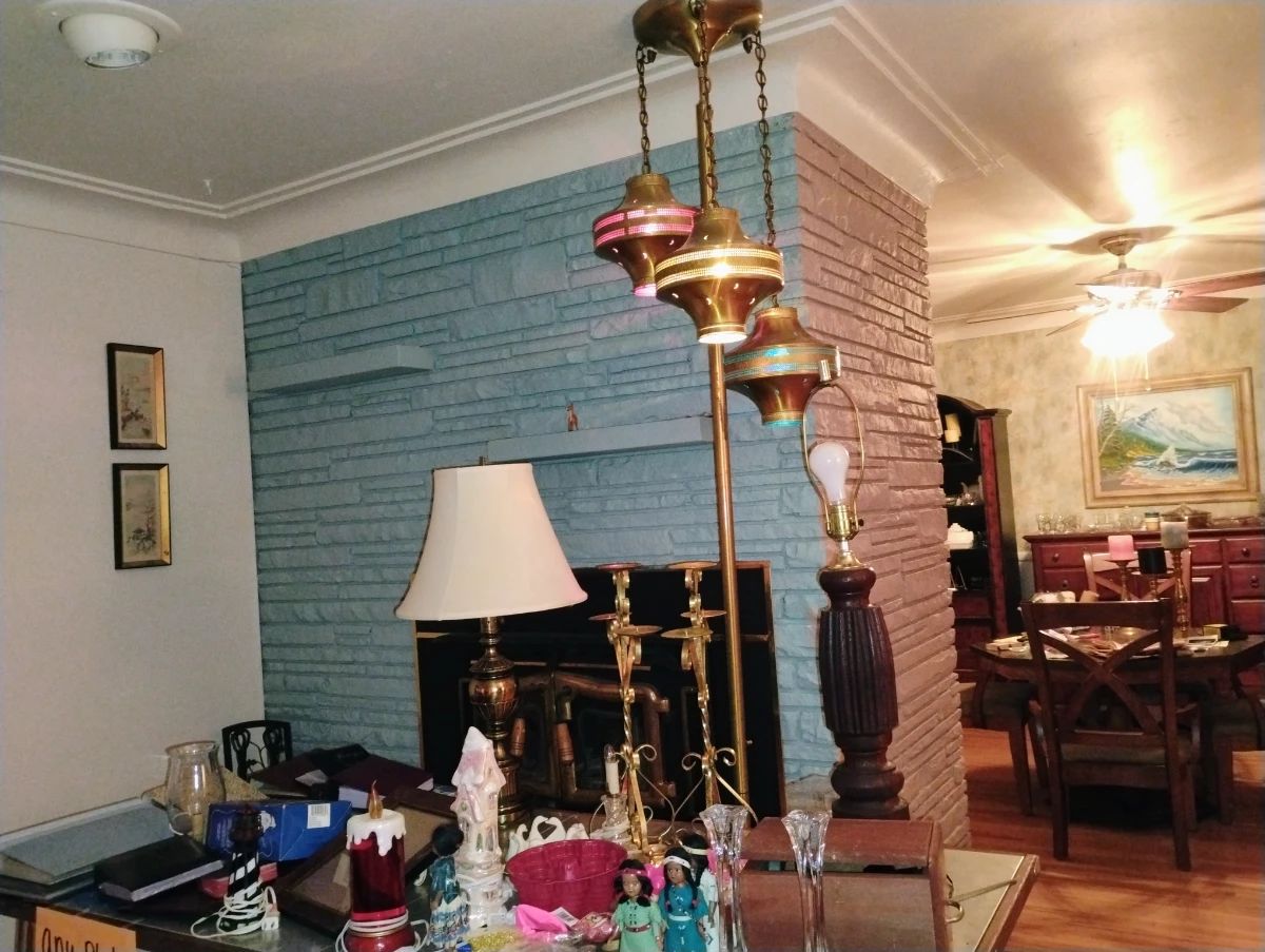 Fabulous one of a kind brass floor lamp. Assortment of lighting, photo albums, and other unique items. 