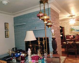 Fabulous one of a kind brass floor lamp. Assortment of lighting, photo albums, and other unique items.