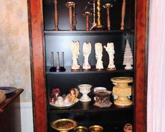 Candle holders and angel figurines.