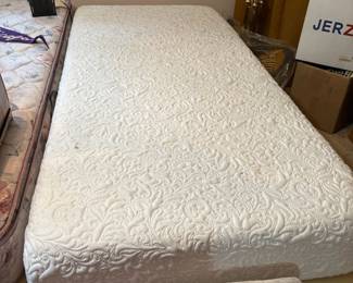 one of two twin lift beds