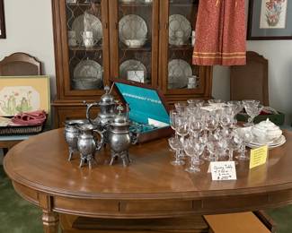 1970's dining table with 3 leaves and 6 chairs plus china cabinet