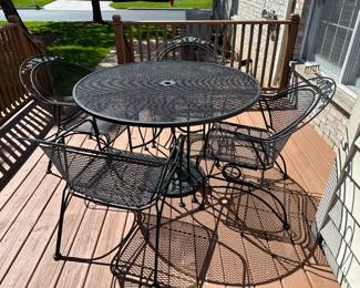 Metal patio table and 4 chairs