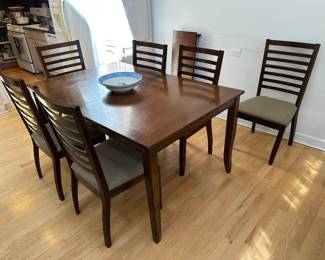 Wood dining table with 6 chairs (sold as is)