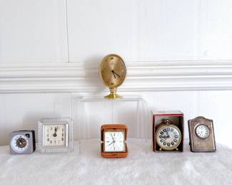 vintage table alarm clock west germany (in box), vintage R. Carr sterling silver desk clock, vintage swiza swiss made travel alarm clock tan leather case, swiza 8 uti brass alarm clock oval