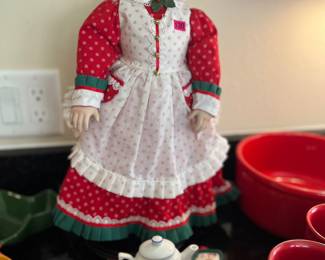 vintage 1989 Danbury Mint Mrs. Claus porcelain doll, complete with a tea set
