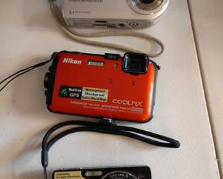 lots of vintage cameras and lenses 35mm nikon cool pix etc