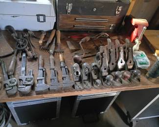 vintage monkey wrenches and hand planes