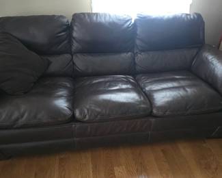 2 brown leather couchs 