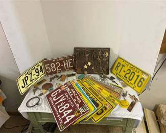 Lot Of License Plates And Old Keys